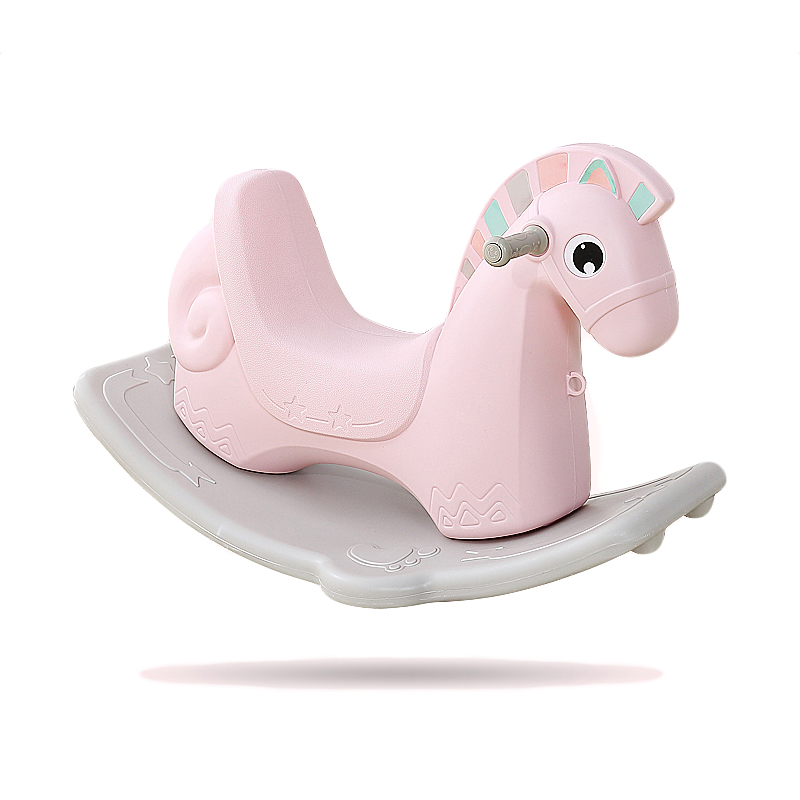 pink plastic rocking horse